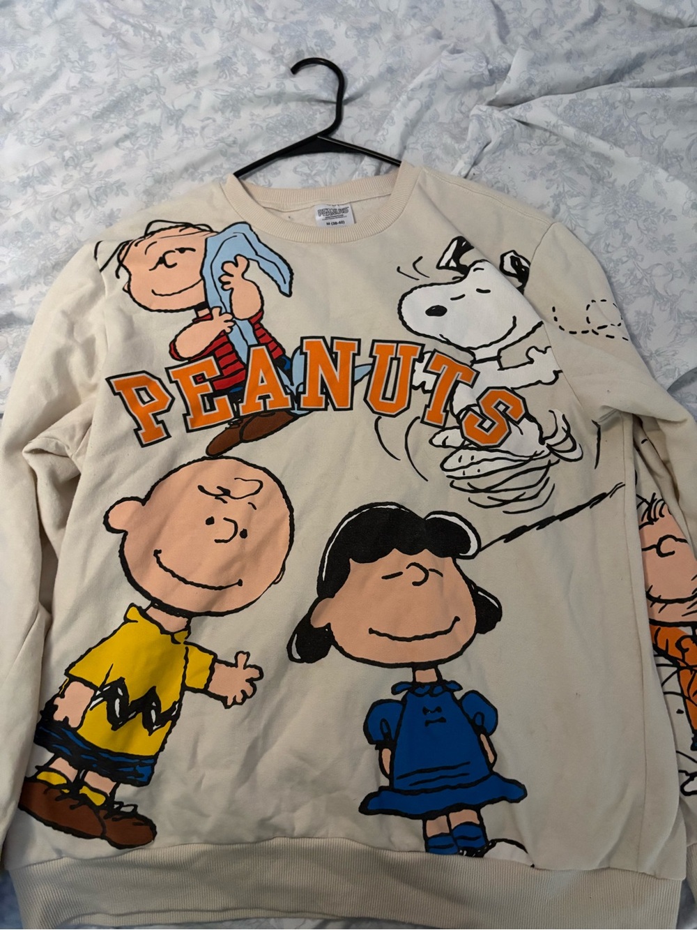 Peanuts Kids Cream Sweatshirt with Orange Logo and Blue & Yellow Characters